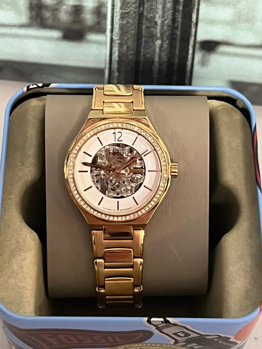 Fossil Women's Eevie BQ3781 Gold Tone Watch, Crystal Bezel Skeleton White